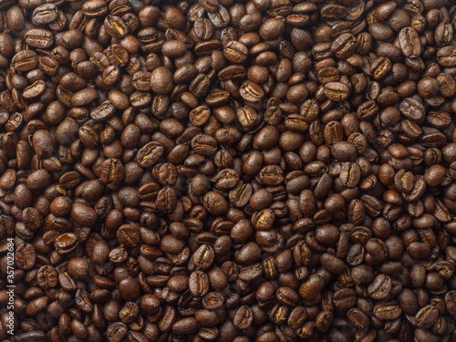 Top view  roasted coffee beans  brown  suitable for background images.