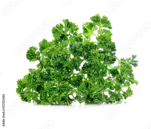 Leaves of parsley isolated on white background.