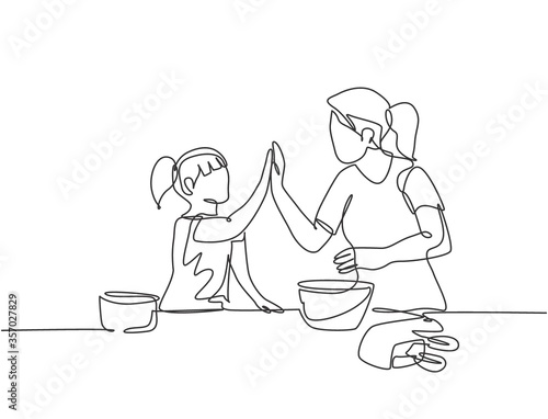 Single line drawing of mother and daughter preparing to cook some cookies at the kitchen and giving high five gesture. Parenting concept continuous line draw design vector graphic illustration