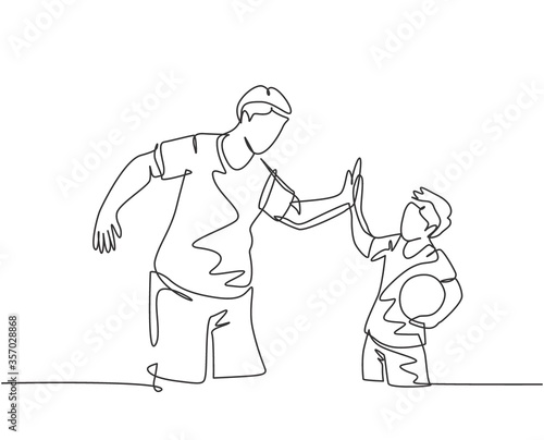 Single line drawing of young happy father and son playing football together on outdoor field and give high five gesture. Parenting concept continuous line draw design vector graphic illustration