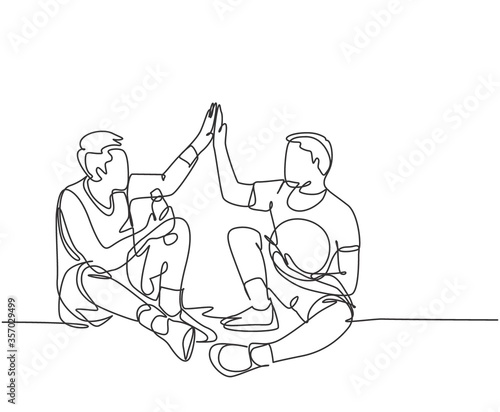 One line drawing of two young happy men take a rest after playing basketball at court and giving high five gesture. Sport game concept continuous line draw graphic design vector illustration
