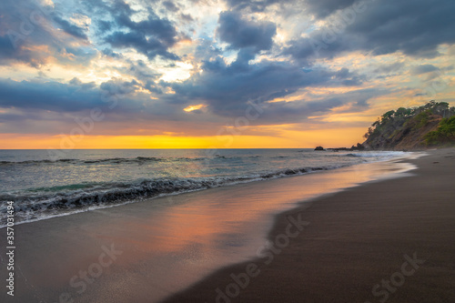 A beautiful beach sunset along the ocean in Costa Rica.