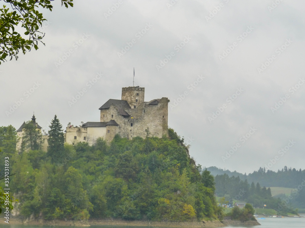 Czorsztyn, Poland, August 7, 2017, wide shot at reimants of Czorsztyn Castle. Czorsztyn, Poland, August 7, 2017, wide shot at reimants of Czorsztyn Castle.