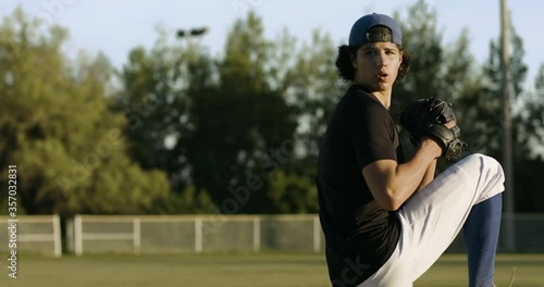Baseball Pitcher throwing fastball. Stepping up to the mound to throw a fastball. Baseball pitcher on summer day throws a perfect pitch. Shot in 4k.