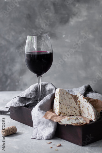 Red wine with homemade cheese  photo