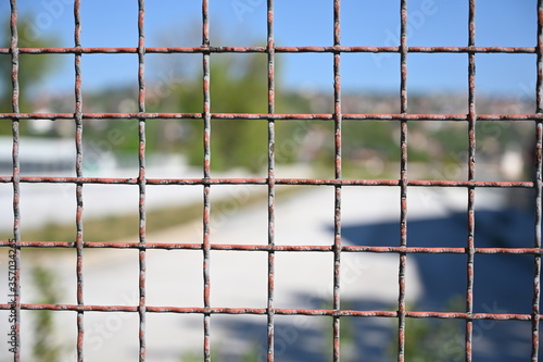 Metal fence with a square pattern