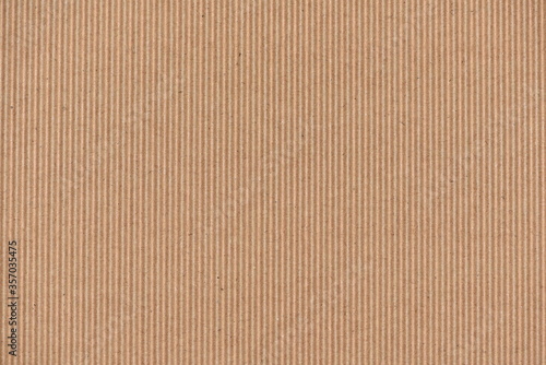 Textured corrugated striped cardboard with natural fiber parts © zilber42