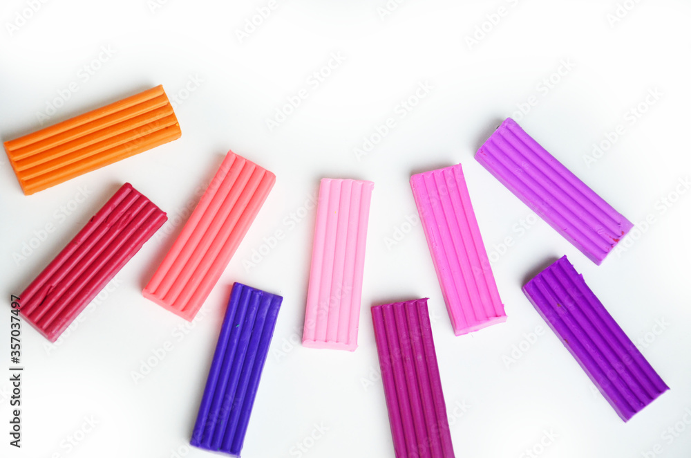 A set of colors of Modeling clay. Modeling and design for children. on white background A set of colors of Modeling clay. Modeling and design for children. on white background