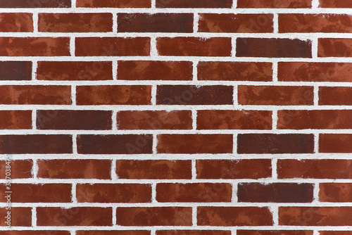 Background texture of old Victorian bricks and mortar. Dark red bricks wall with white seam. new brick wall texture background.
