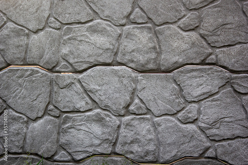 An image of a grungy weathered limestone rubble wall surface.