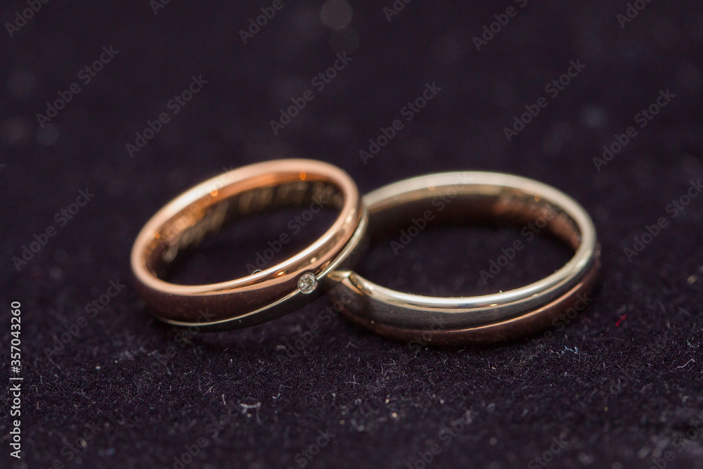 wedding rings on black background wedding rings on black background