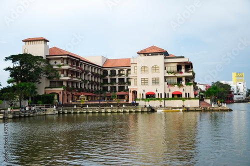 MELAKA, MALAYSIA -NOVEMBER 12, 2012: The scenery along the way at Melaka waterfront while riding the Melaka River Cruise. The river is the main trade route during the golden age of the Malacca Sultana