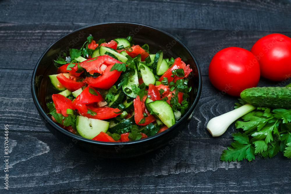 vegetable salad - tomatoes, cucmbers, parsley, onion. healthy and vegetarian food style vegetable salad - tomatoes, cucmbers, parsley, onion. healthy and vegetarian food style