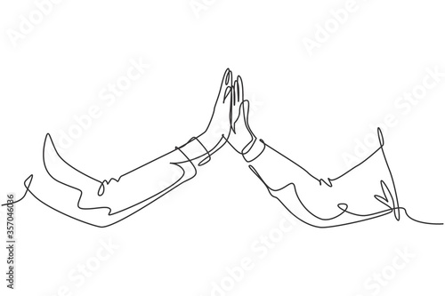 One line drawing of two men giving high fives gesture hands wearing office clothes to celebrate success. Business teamwork concept. Trendy continuous line draw graphic design illustration