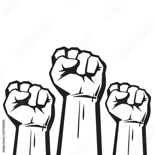 Clenched fists raised in protest. Three human hands raised in the air. Vector illustration. photo