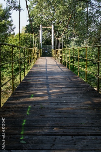 Damaged footbridge on cycling trail after flood near Skalicka. Moravia. Czechia. Europe.