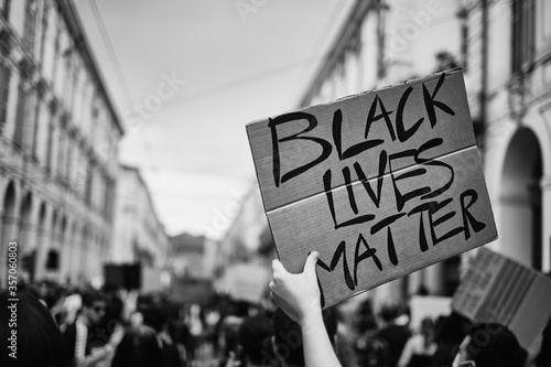 Fototapeta Naklejka Na Ścianę i Meble -  Turin, Italy Antifa protesters marching in the streets in support of BLM Black Lives Matter movement 
