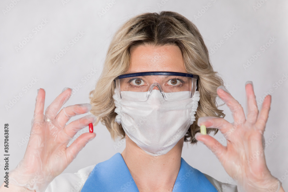 Pills in the hands of a doctor. The cure for a serious illness. Pills in the hands of a doctor. The cure for a serious illness.