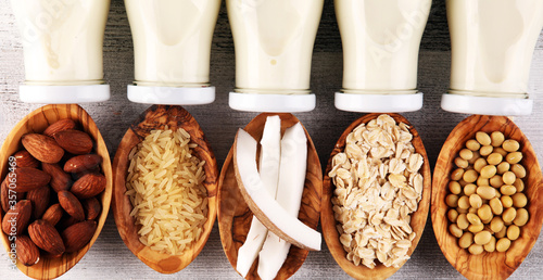 Various vegan plant based milk alternatives and ingredients. Dairy free milk substitute drink, healthy eating and drinking