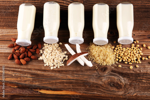 Various vegan plant based milk alternatives and ingredients. Dairy free milk substitute drink, healthy eating and drinking