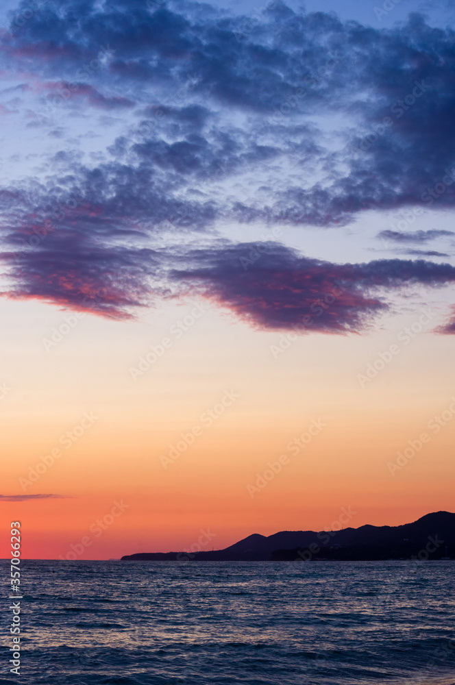 Amazing sea sunset, the sun, waves, clouds
