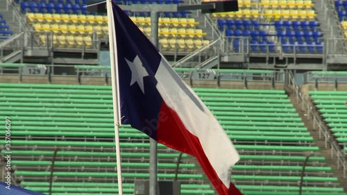 Texas flag in an empty stadium photo