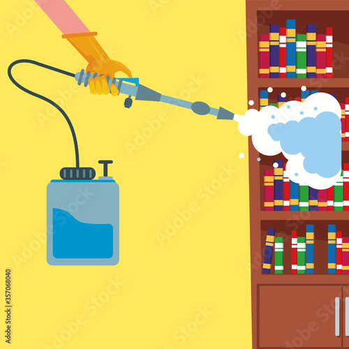 hand with rubber glove with disinfectan sprayer housekeeping