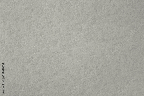 Paper texture cardboard background, grey color. Recyclable material