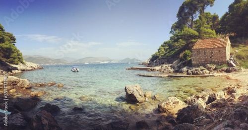 Idyllic house on a beach. Kolocep, Croatia. photo