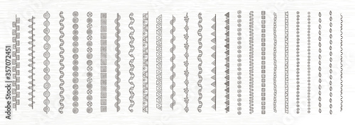 Doodle dividers, brush lines and borders set. Rustic decorative design elements and patterns photo