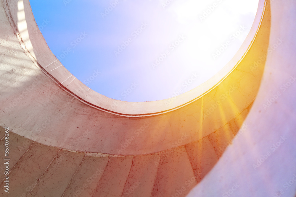 Obraz premium walkway to heaven. Stairway up, sunlight sky.