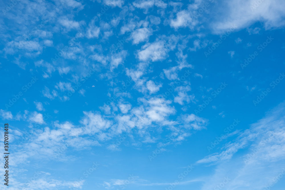 The sky has clouds in the daytime.. Blue sky background with clouds. The sky has clouds in the daytime.. Blue sky background with clouds.
