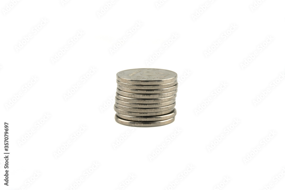 Stack of metal Russian ruble coins isolated on a white background Stack of metal Russian ruble coins isolated on a white background