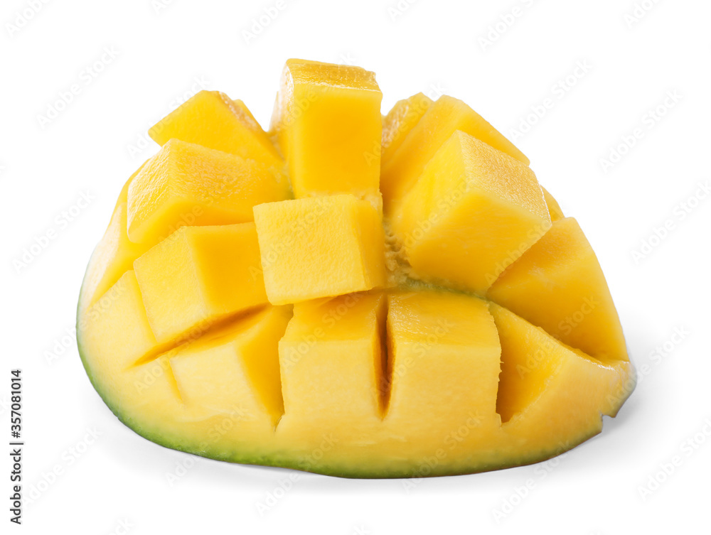 Half of ripe mango cut into cubes isolated on white Half of ripe mango cut into cubes isolated on white