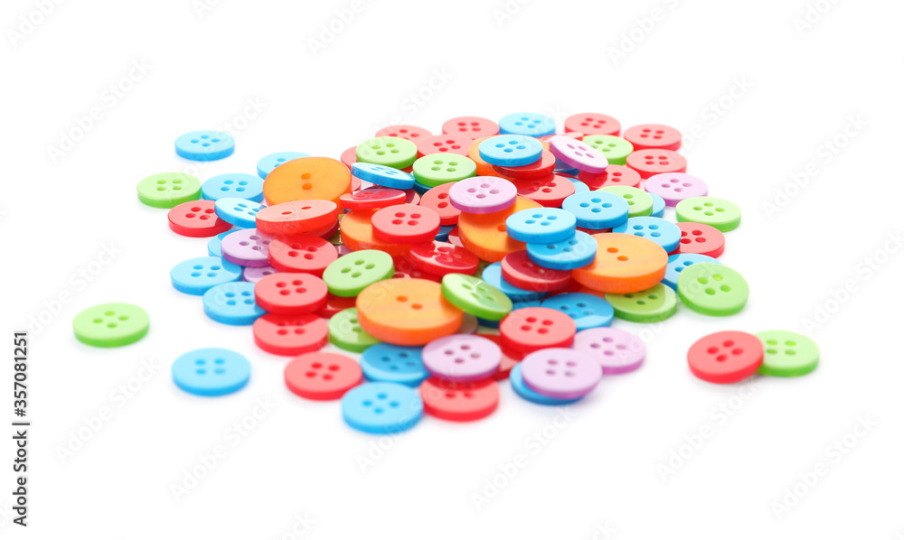 Many colorful plastic sewing buttons isolated on white Many colorful plastic sewing buttons isolated on white