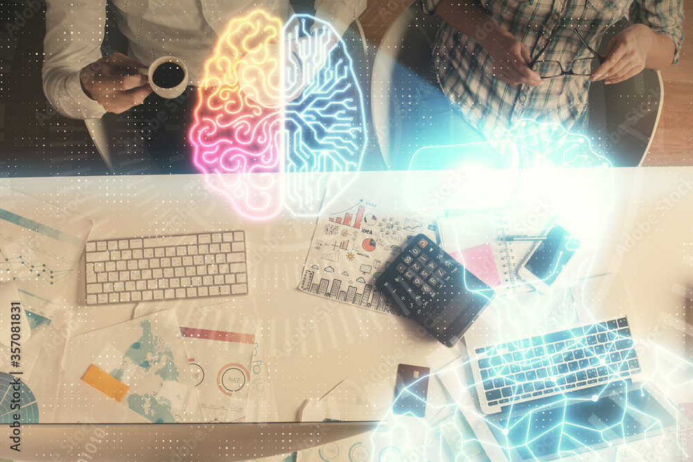 Double exposure of man and woman working together and man in virtual glasses hologram drawing. Computer background. Top View. VR, AR concept. Double exposure of man and woman working together and man in virtual glasses hologram drawing. Computer background. Top View. VR, AR concept.