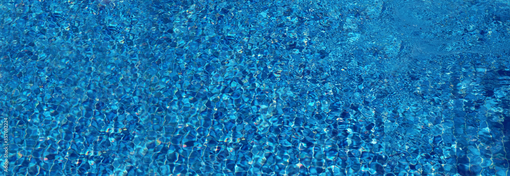 Outdoor swimming pool with clear water on sunny day. Banner design Outdoor swimming pool with clear water on sunny day. Banner design