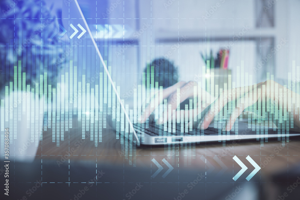Double exposure of woman hands typing on computer and forex chart hologram drawing. Stock market invest concept. Double exposure of woman hands typing on computer and forex chart hologram drawing. Stock market invest concept.