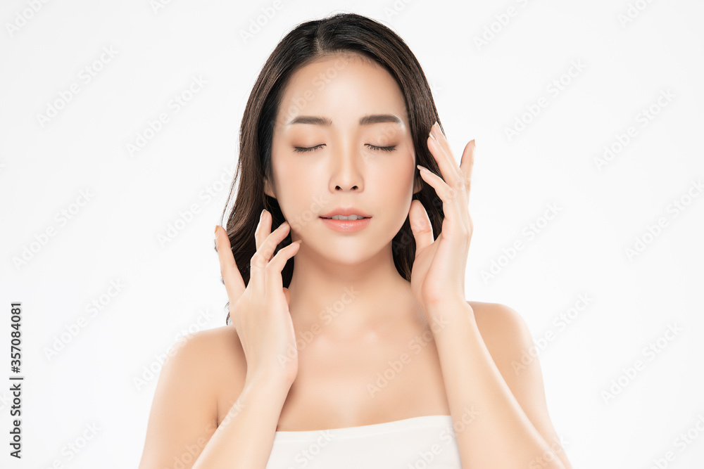 Beautiful Young asian Woman touching her clean face with fresh Healthy Skin, isolated on white background, Beauty Cosmetics and Facial treatment Concept. Beautiful Young asian Woman touching her clean face with fresh Healthy Skin, isolated on white background, Beauty Cosmetics and Facial treatment Concept.