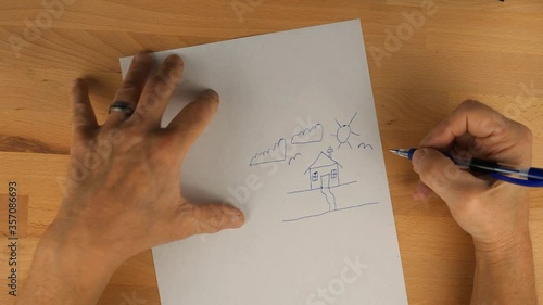 A man doodling in fast motion