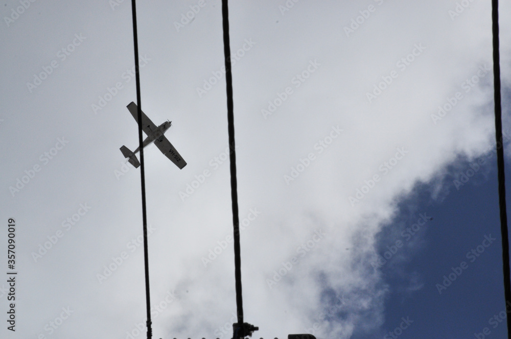 propeller plane flying around the neighbourhood practicing in the morning. propeller plane flying around the neighbourhood practicing in the morning.