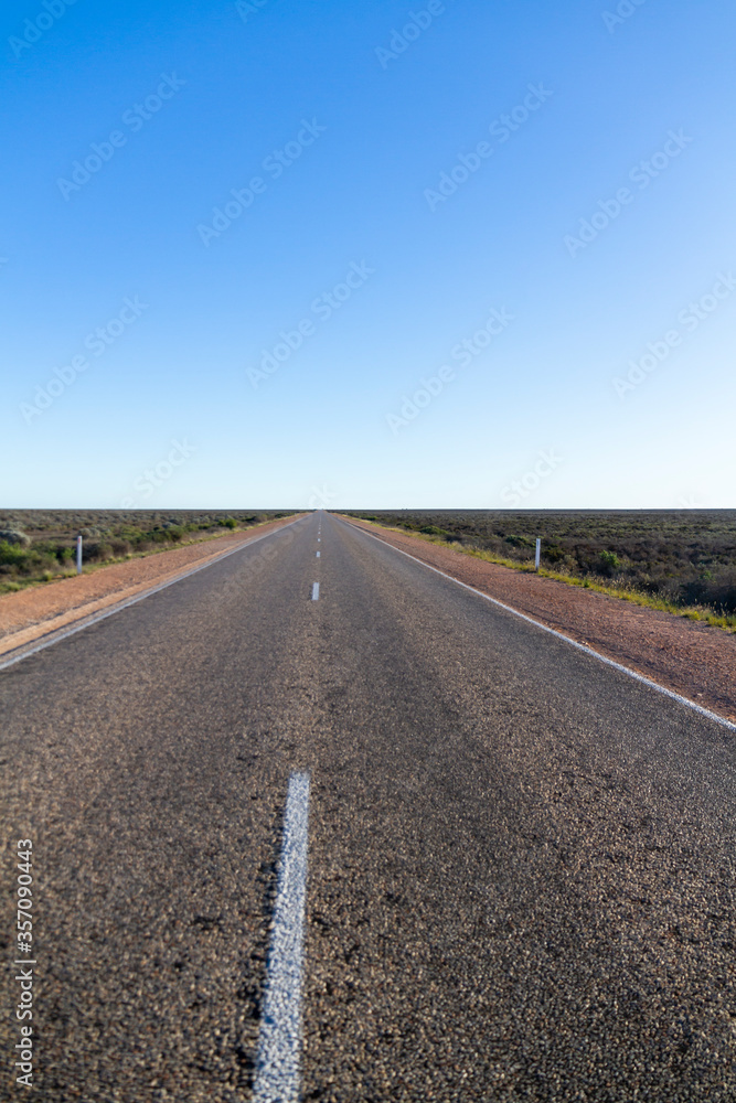 A long highway and straight horizon on the Nullarbor, South Australia