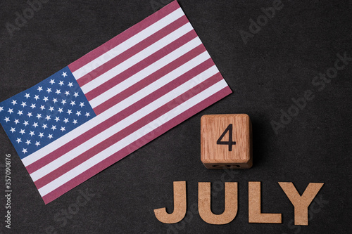 4th of July. USA flag on black background. Independence Day decoration