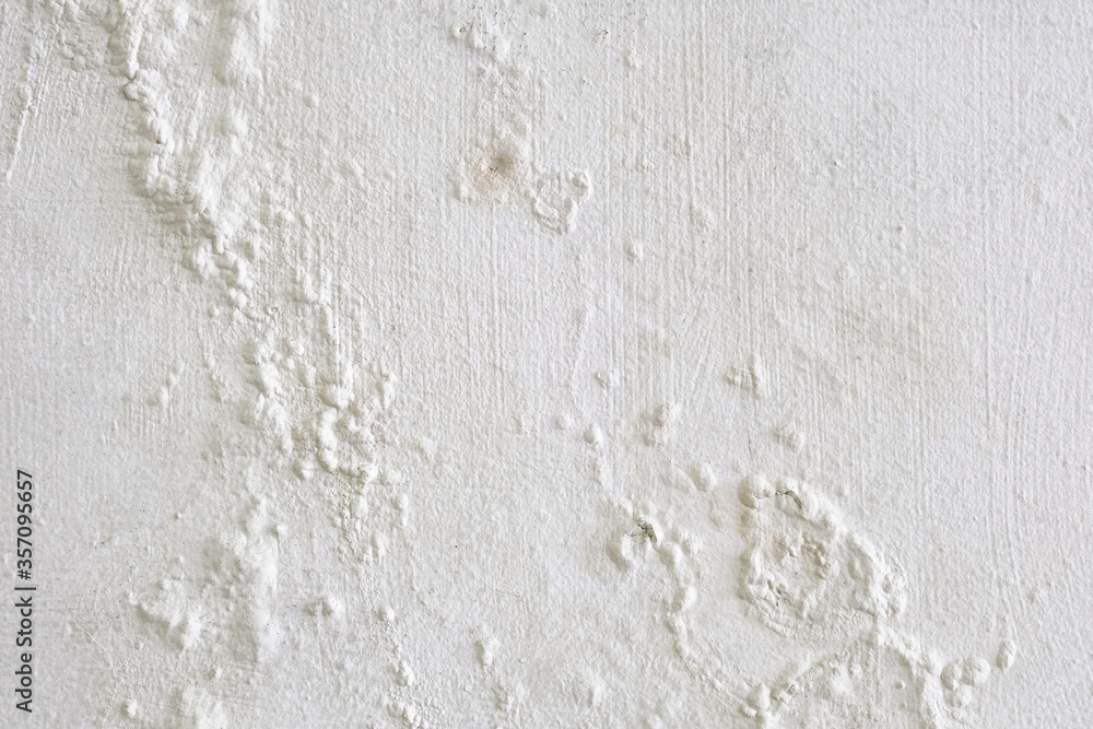 Wall showing peeling and bubbling paint due to water leak behind wall