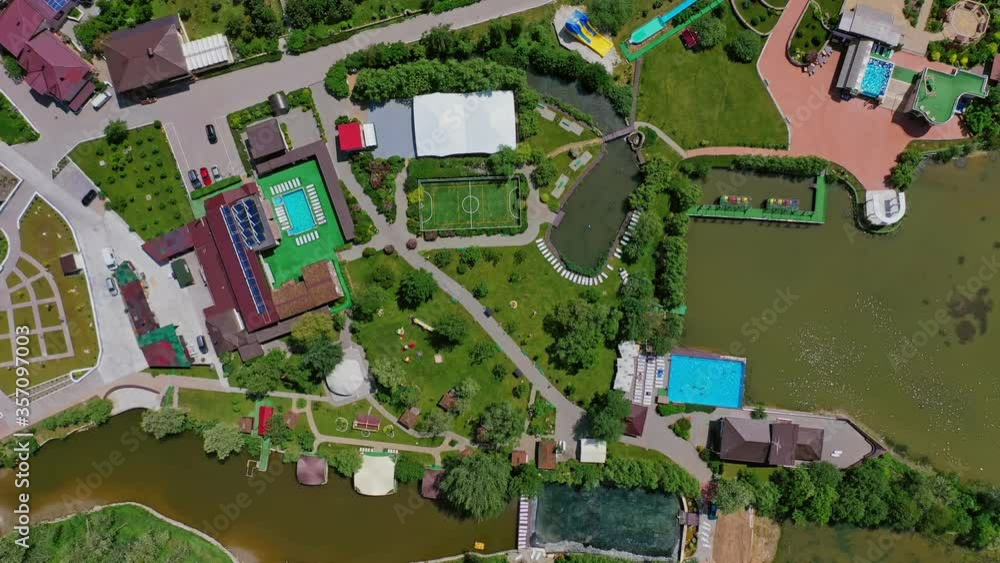 Aerial view of resort complex. Modern vacation resort complex with swimming pool Aerial view of resort complex. Modern vacation resort complex with swimming pool