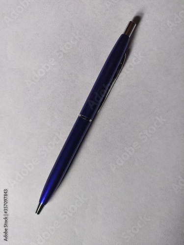 close up of a ball pen with white background. Pen can be used in school, office, business. 