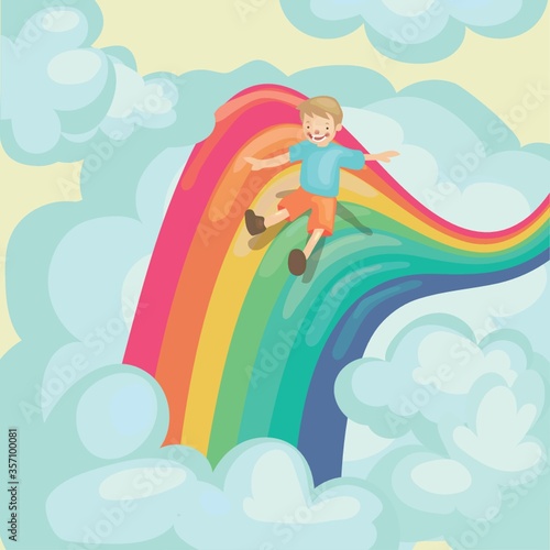 boy sliding on rainbow