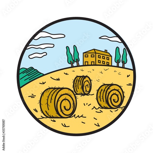 hay bale on a hill