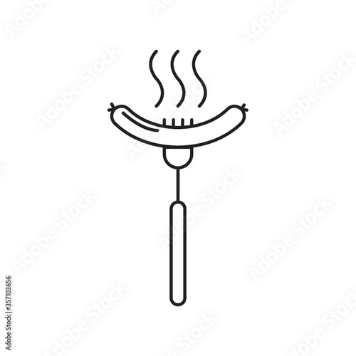 sausage in fork