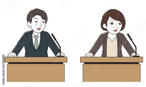 記者会見でインタビューに答える